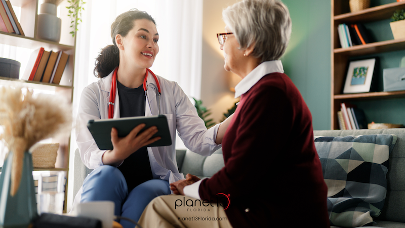 Female doctor speaking with an older female patient during a consultation.